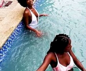 cool black girl with a shaved pussy is shouting loudly at the pool