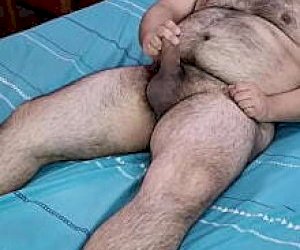hairy lady  is covered with sperm