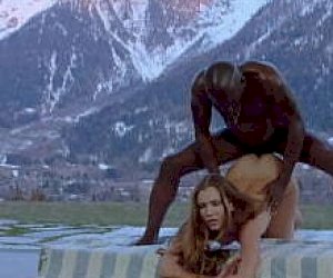 customer with a large tassel squirts on her face