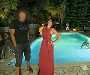 hot mom  is playing with a few guys at once at the pool