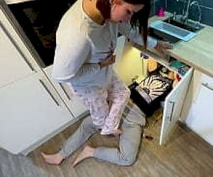 young brunette  is pleasuring a guy with a hand