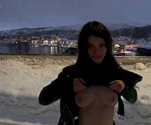 hairy teenager  is pleasuring a guy with a hand in public