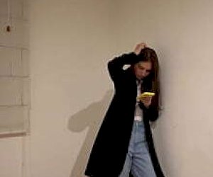 young lady  is kissing in hiding