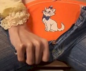 bitch with dark hair is doing a striptease