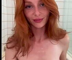 skinny girl with red hair is fuckked doggy style