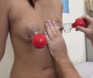 Asian women with dark hair is fuckked doggy style