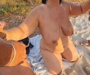 big beautiful woman with big tits cuckolding on the beach