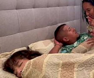 tattooed wanton with dark hair is covered with sperm