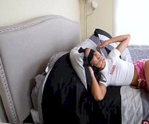 young women with dark hair puts the dick deep into her throat