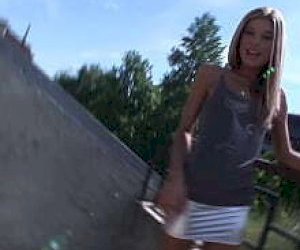 young eighteen with blond hair rides outdoor