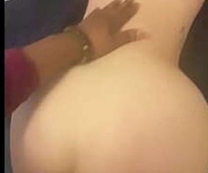 wet woman with dark hair is fuckked doggy style