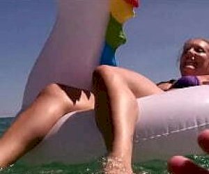 young wanton with blond hair  on the beach