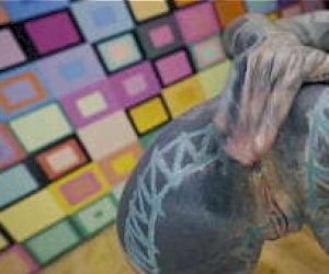 tattooed young lady  culminates