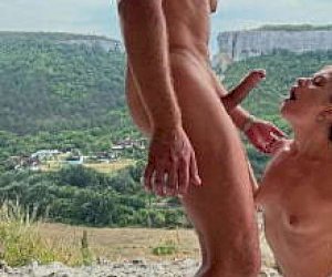 guy  receives a blowjob outdoor
